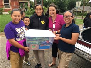 students with supplies 