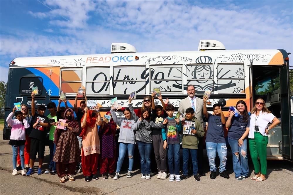 Celebrating the opening of the OKCPS Foundation’s second ReadOKC On the Go! Book Bus